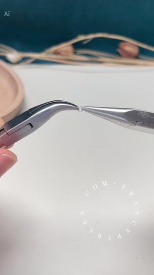 Crimp the second wire protector between two pliers