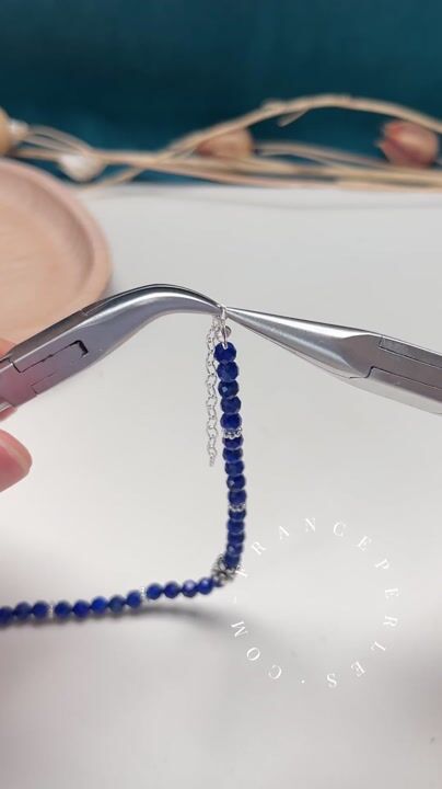 Natural lapis lazuli bracelet on blue polyester cord